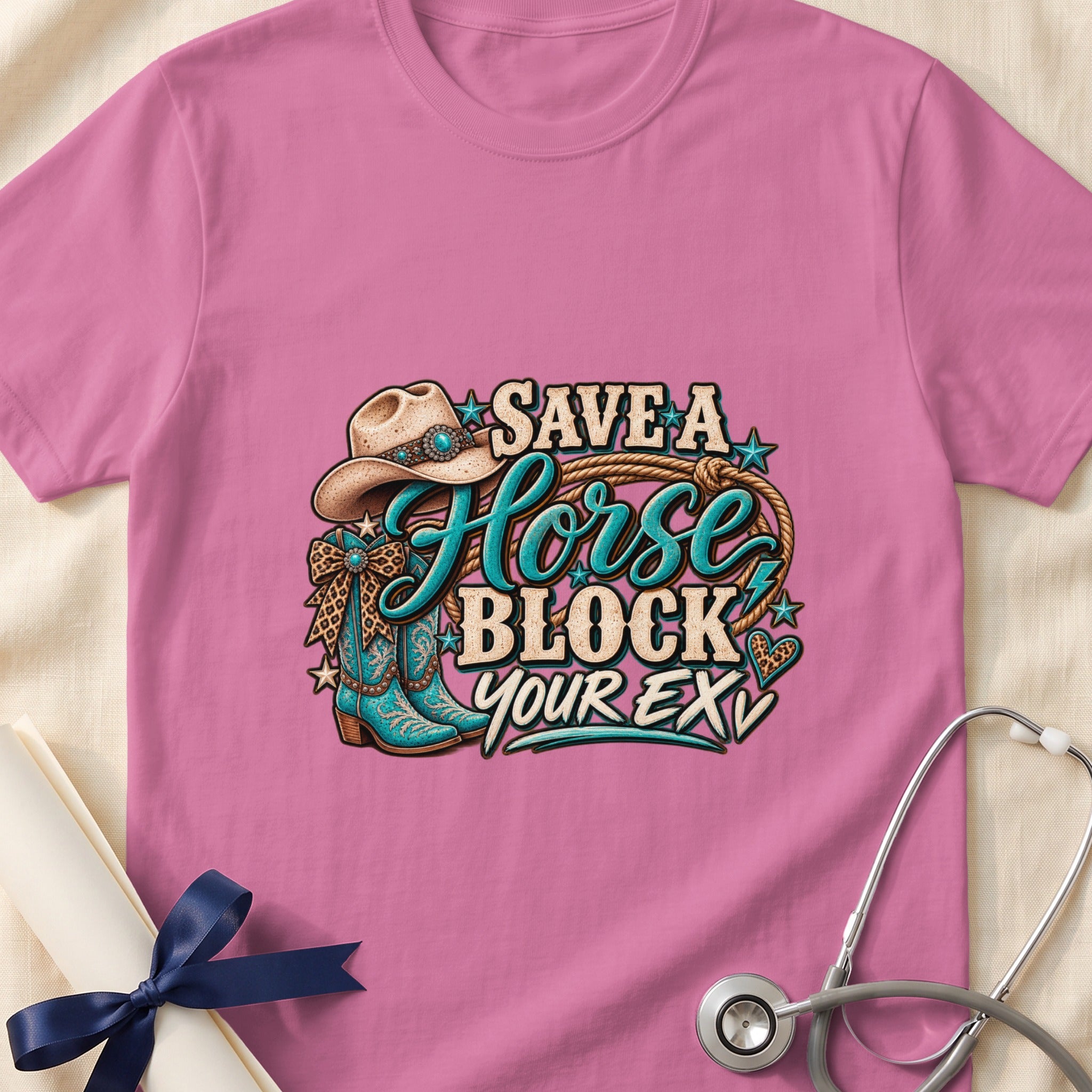 Pink t-shirt with "Save a Horse Block Your Ex" text and cowboy boots graphic.